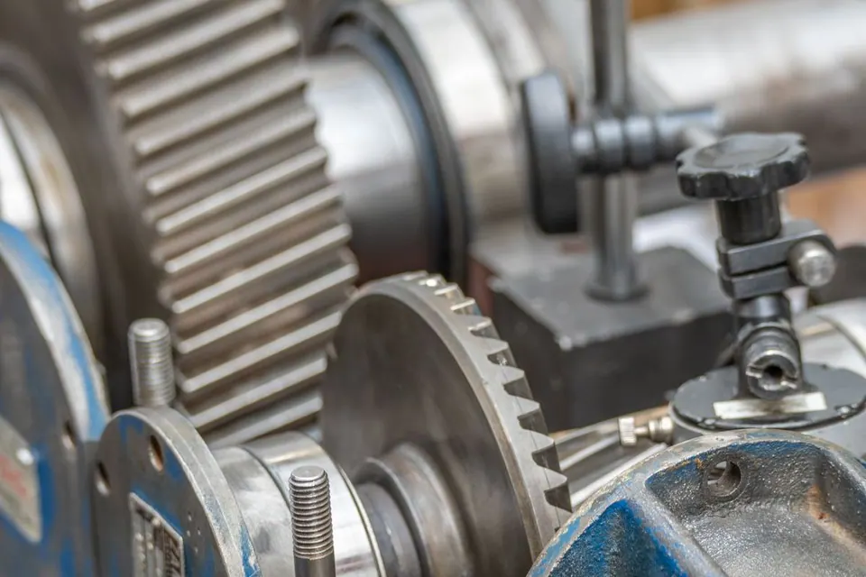 Exposed metal gears and machine components